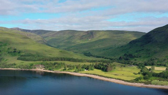 Aerial view of Loch Eil/Linnhe situated in landscape of Scottish Highlands, lush green hills and deep lake - panorama of Highlands of Scotland from above, United Kingdom, Great Britain, Europe