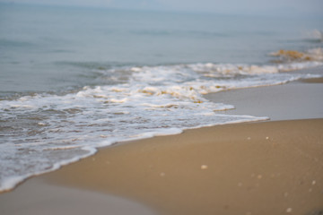 Waves were crashing onto the beach