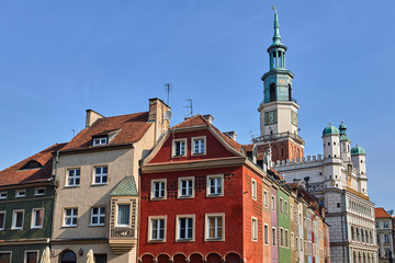 Old market square with historic tenement houses and a Renaissance town hall  in Poznan.