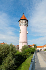 Fototapeta premium Brezice, Slovenia, 02/08/2019 Ancient Brezice water tower. The tower water tank was built in 1914 for the needs of the city's aqueduct. The tower is 46 meters high.
