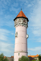 Fototapeta premium Brezice, Slovenia, 02/08/2019 Ancient Brezice water tower. The tower water tank was built in 1914 for the needs of the city's aqueduct. The tower is 46 meters high.