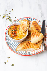 chickpeas hummus with olive oil and smoked paprika