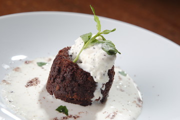 Chocolate and nut bread with vanilla ice cream and choco chips.
