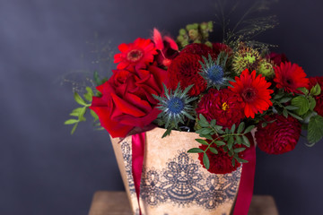 Colorful fresh bouquet of flowers on isolated black background