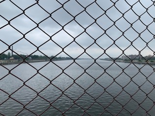 chain link fence with barbed wire