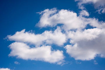 Naklejka na ściany i meble White clouds in the blue sky. Ozone Layer. Blue background