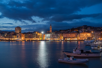 Fototapeta na wymiar Neighbourhood Oneglia by night - old harbor of the city of Imperia, Region of Liguria, Italy