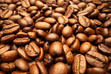 Very big roasted brown coffee beans background