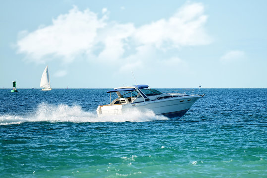 Modern Powerboat Speeding On Lake