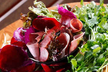 Serrano ham salad, turkey ham, salami, purple cabbage, hard-boiled egg, peppers, avocado, olives...