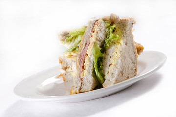 A sandwich club, also called a clubhouse sandwich, is a sandwich of bread, sliced ​​cooked...