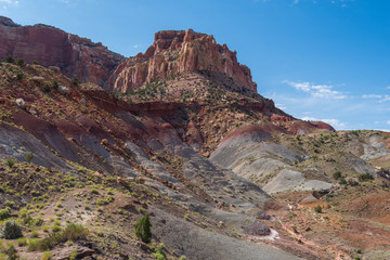 Capitol Reef National Park low angle landscape of purple and pink barren stone hillside