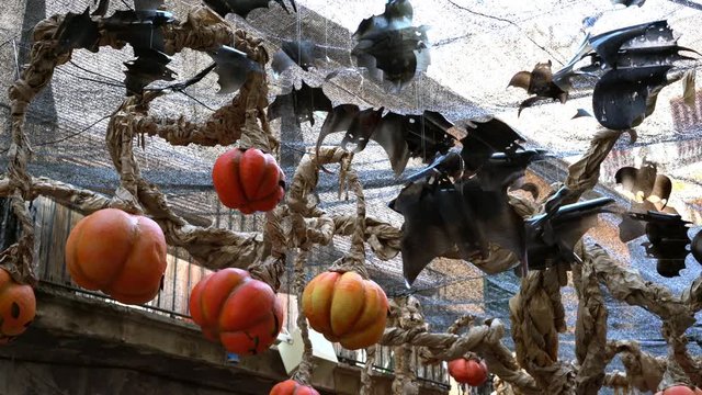 bats and pumpkin lanterns made from recycled plastic on halloween celebration.