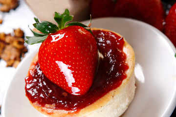 Cheese pie with strawberries and walnut.