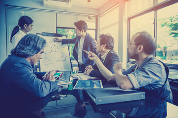 businessmen brainstorming for strategy of business investment,businessmen review chart and document of investment information