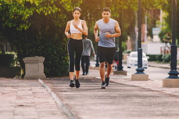 Obraz premium people runner running on running road in city park