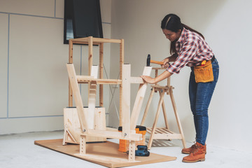 woman worker in the carpenter workroom.