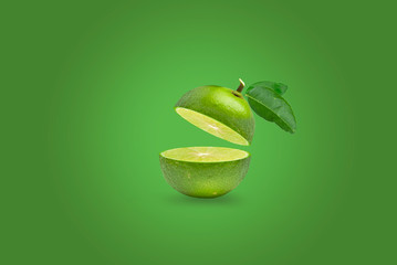 Lime slice with isolated on green background