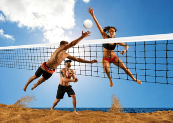 Beach volleyball player in action at sunny day