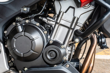 Close up of modern motorcycle engine detail and structure. Select focus