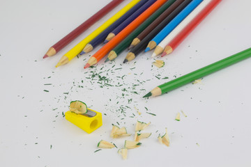 Set of colored pencils on a white background