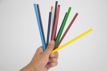 Set of colored pencils on a white background