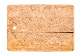 Old wooden cutting board isolated on white
