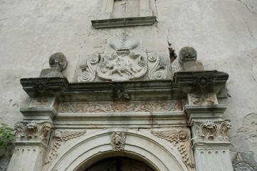 Old abandoned ruined roman catholic church in the village