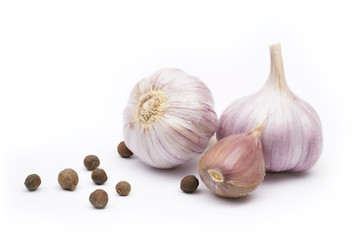 isolated garlic. fresh garlic with black allspice