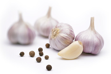 solated garlic. fresh garlic with black allspice