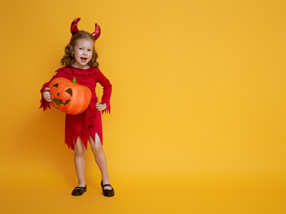 little devil with a pumpkin