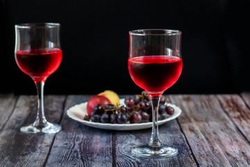 Pink wine. Wine in a glass. Traditional Georgian wine according to ancient technology. Copy space Close-up and horizontal orientation.