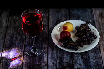 Pink wine. Wine in a glass. Traditional Georgian wine according to ancient technology. Close up and horizontal orientation.