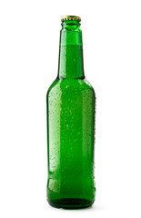Beer bottle with drops on a white background. Isolated