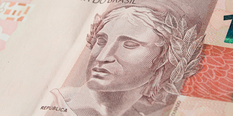 Brazilian effigy of republic symbol at the ten real banknote. 10 reais brl. Macro photo with depth of field.
