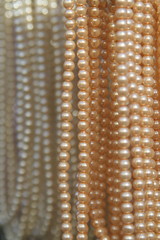 close-up of necklaces with pearls