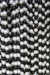 close-up of necklaces with pearls