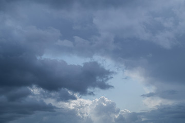 Naklejka na ściany i meble Dramatic clouds in the skies