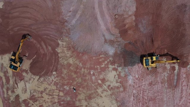 Aerial view excavator working on a construction site.