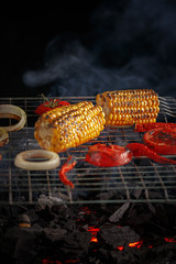 Appetizing grilled corn and vegetables. Top view