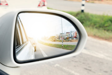 Rear view mirror car. Clear rear traffic conditions on asphalt roads.