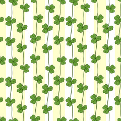 Clover seamless pattern. Vector textile design. Nature print with clover ornament on yellow background.