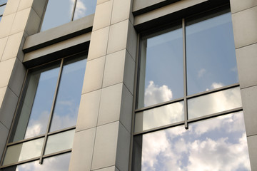 Plakat Modern office building with tinted windows. Urban architecture