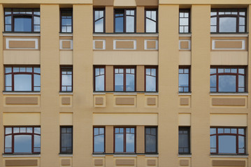 Fototapeta premium Wall of vintage building with beautiful windows