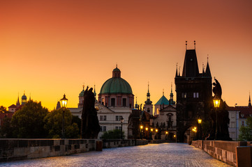 Fototapeta na wymiar Charles Bridge at sunrise in Prague, Czech Republic. Famous travel destination