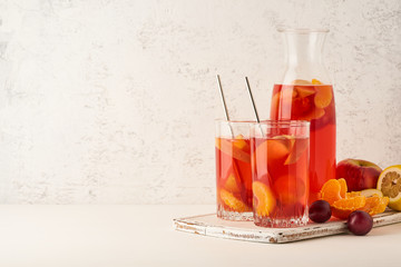 Stewed fruits in Glass Tube on pastel background side view copy space