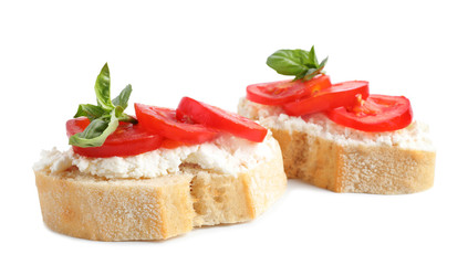 Tasty fresh tomato bruschettas on white background