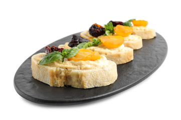 Tasty fresh tomato bruschettas on white background