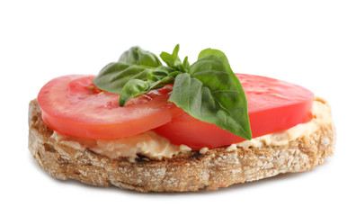 Tasty fresh tomato bruschetta on white background