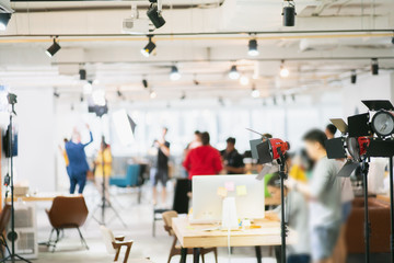 Group of people at work, Workshop event management blur for background.